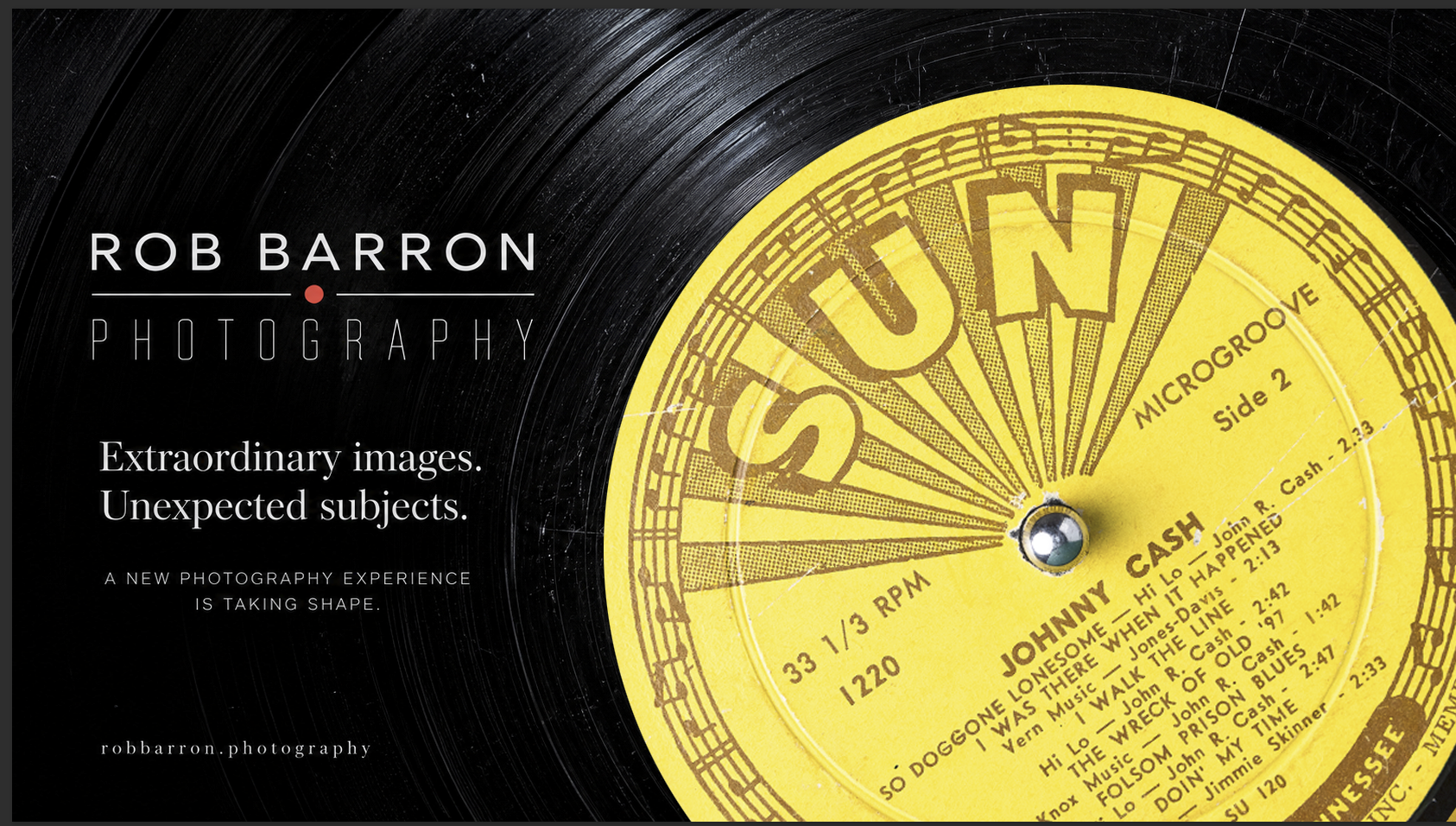 Rob Barron Photography. Extraordinary images. Unexpected subjects. A new photography experience is taking shape. robbarron.photography. An oversized tilted yellow Sun Records label against textured black vinyl.
